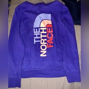 Purple “The North Face” hoodie.